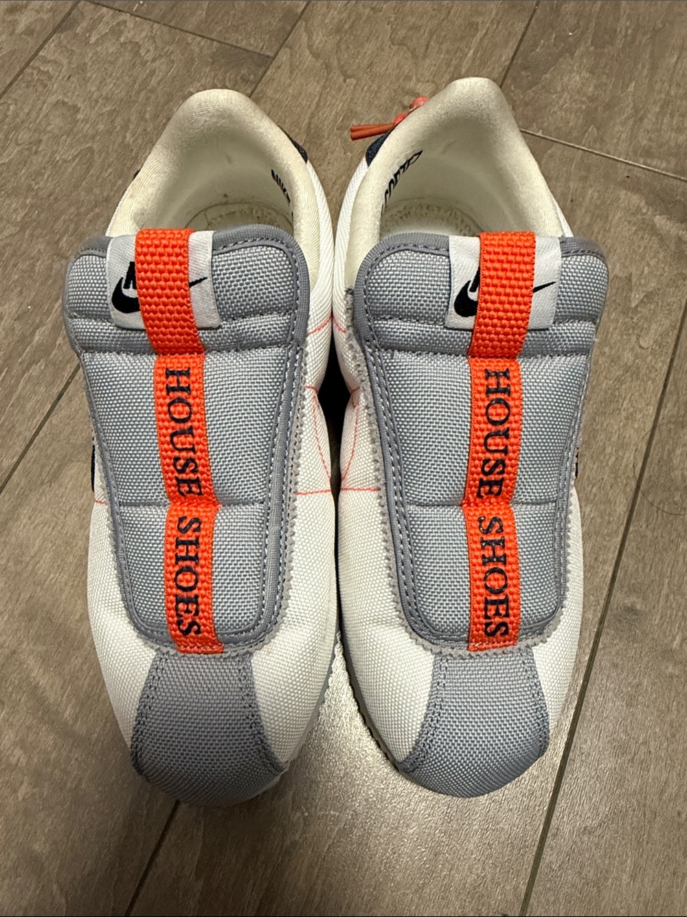 Nike White and Gray Athletic Slip-On Sneakers with Orange Pull Tab
